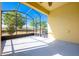 The screened lanai offers an ideal space for relaxation and views of the backyard at 3205 Sonesta Ct # F, Clermont, FL 34711