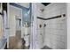 This bathroom includes a beautifully tiled shower and a white vanity at 427 Egret Place Dr, Winter Garden, FL 34787