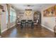 A dining room featuring an elegant wood table and chairs with a decorative chandelier at 427 Egret Place Dr, Winter Garden, FL 34787