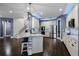 Open floor plan with an area for dining featuring modern décor and hardwood floors at 427 Egret Place Dr, Winter Garden, FL 34787