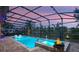 Captivating pool with a spa and fire feature, creating an inviting outdoor retreat with picturesque surroundings at 427 Egret Place Dr, Winter Garden, FL 34787