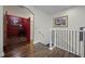 Hallway leading to the home theater with a popcorn machine and themed decor at 427 Egret Place Dr, Winter Garden, FL 34787