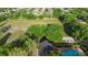 Aerial view of community playground, sand volleyball court, and green space at 453 Kettering Rd, Deltona, FL 32725