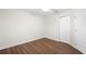 Bright bedroom features wood-look flooring, closet and ceiling fan at 453 Kettering Rd, Deltona, FL 32725