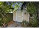Garden shed nestled among trees providing storage for tools and equipment, enhancing the outdoor space at 453 Kettering Rd, Deltona, FL 32725