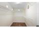 Large walk-in closet with wood-look floor and ample shelving for organized storage of clothes and accessories at 453 Kettering Rd, Deltona, FL 32725