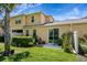 The backyard is landscaped with grass, plants and an easy to maintain patio at 484 Harbor Winds Ct, Winter Springs, FL 32708