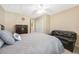 Neutral bedroom features a ceiling fan, closet, dresser and comfortable furniture set at 484 Harbor Winds Ct, Winter Springs, FL 32708