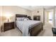 Bright bedroom boasts a spacious layout with furniture set and neutral color palette at 484 Harbor Winds Ct, Winter Springs, FL 32708