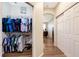 View of hallway and walk-in closet with ample storage space at 484 Harbor Winds Ct, Winter Springs, FL 32708