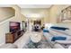 Open-concept living area with a seamless transition to the dining space and an entertainment center at 484 Harbor Winds Ct, Winter Springs, FL 32708