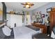 Cozy bedroom with ceiling fan, closet, and comfortable furnishings at 5112 Jetsail Dr, Orlando, FL 32812