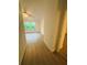 Inviting bedroom featuring a large window and neutral paint at 5999 Lake Pointe Dr # 602, Orlando, FL 32822