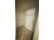 Walk-in closet with shelving and wood-look floors at 5999 Lake Pointe Dr # 602, Orlando, FL 32822