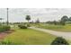 Scenic view of the lush green golf course, perfect for avid golfers to enjoy at 5999 Lake Pointe Dr # 602, Orlando, FL 32822