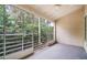 The screened in patio provides stunning views of lush greenery, perfect for relaxation and enjoying nature at 5999 Lake Pointe Dr # 602, Orlando, FL 32822