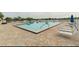 Large community pool with tiled deck and lounge chairs for relaxing by the water at 5999 Lake Pointe Dr # 602, Orlando, FL 32822