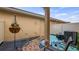 Cozy patio area with outdoor seating, perfect for relaxing and enjoying the outdoors at 7660 Ripplepointe Way, Windermere, FL 34786
