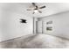 Bedroom features carpet flooring, a ceiling fan, and a wall-mount for a television at 812 Marcel Loop, Davenport, FL 33837