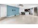 Open-concept living space features tile flooring, a ceiling fan, and a dining area at 812 Marcel Loop, Davenport, FL 33837