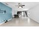 Open-concept living space features tile flooring, a ceiling fan, and a dining area at 812 Marcel Loop, Davenport, FL 33837