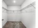 Spacious walk-in closet with wire shelving for ample storage and organization at 812 Marcel Loop, Davenport, FL 33837