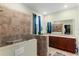 Bathroom showcasing a walk-in shower and double sink vanity at 8205 Sw 78Th Terrace Rd, Ocala, FL 34476