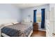 Bedroom with wood-look floors and abundant natural light at 8205 Sw 78Th Terrace Rd, Ocala, FL 34476