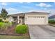 Charming single-story home with well-manicured lawn and two-car garage in a sunny neighborhood at 8205 Sw 78Th Terrace Rd, Ocala, FL 34476