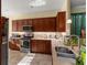 Modern kitchen featuring stainless steel appliances, tile backsplash, and ample counter space at 8205 Sw 78Th Terrace Rd, Ocala, FL 34476