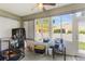 Bright sunroom with large windows providing ample natural light and outdoor views at 8205 Sw 78Th Terrace Rd, Ocala, FL 34476