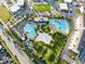 Aerial view showcasing the community pool, beach volleyball court, and surrounding amenities at 8638 Finsen St, Orlando, FL 32827