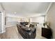 Open game room featuring a ping pong table, comfortable seating, and ample space at 8638 Finsen St, Orlando, FL 32827