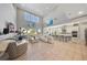Spacious living room with high ceilings, large windows, and open floor plan at 8638 Finsen St, Orlando, FL 32827