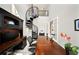 Home office with spiral staircase, built-in desk, and large windows at 8638 Finsen St, Orlando, FL 32827