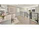 Bright sitting area with makeup vanity, shelving, and multiple windows overlooking the beautiful neighborhood at 8638 Finsen St, Orlando, FL 32827