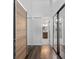 Hallway view of a walk-in closet and luxurious bathroom featuring glass shower and vanity at 1012 Willa Lake Cir, Oviedo, FL 32765