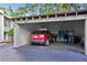 This spacious carport fits two vehicles, and has some extra storage space for bikes at 102 Fairway Dr # 102, Longwood, FL 32779