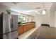 Additional kitchen area with stainless steel appliances and sleek cabinets offers more space at 102 Fairway Dr # 102, Longwood, FL 32779