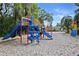 Colorful playground with multiple slides and play structures, perfect for Gathering fun at 102 Fairway Dr # 102, Longwood, FL 32779