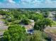 Discover a charming home with solar panels surrounded by lush greenery and serene neighborhood views at 106 Alhambra Ave, Altamonte Springs, FL 32714