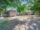 Spacious backyard with a patio area, perfect for outdoor entertaining and relaxation at 106 Alhambra Ave, Altamonte Springs, FL 32714