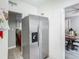 Side-by-side stainless steel refrigerator featured in bright kitchen at 106 Alhambra Ave, Altamonte Springs, FL 32714