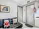 A living room with a futon and wall decor at 106 Alhambra Ave, Altamonte Springs, FL 32714