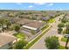 Wide view of backyard with outdoor patio, putting green, and fenced yard in neighborhood at 1199 Playa Del Sol Ln, St Cloud, FL 34771
