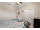 Bedroom features include neutral walls, ceiling fan, closet and adjoining room at 1199 Playa Del Sol Ln, St Cloud, FL 34771