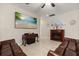 Inviting living room with cozy fireplace, modern furnishings, and tile flooring at 1199 Playa Del Sol Ln, St Cloud, FL 34771