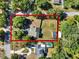 Aerial view of large lot showing house, pool and proximity to nearby road at 12030 Kirby Smith Rd, Orlando, FL 32832