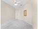 Bedroom showcasing closet, a wall mirror, and ceiling fan, offering a comfortable and inviting space at 131 Wimbledon Cir, Lake Mary, FL 32746