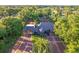 Aerial view of the brick-paved entry to the neighborhood with attractive architecture and manicured landscaping at 131 Wimbledon Cir, Lake Mary, FL 32746